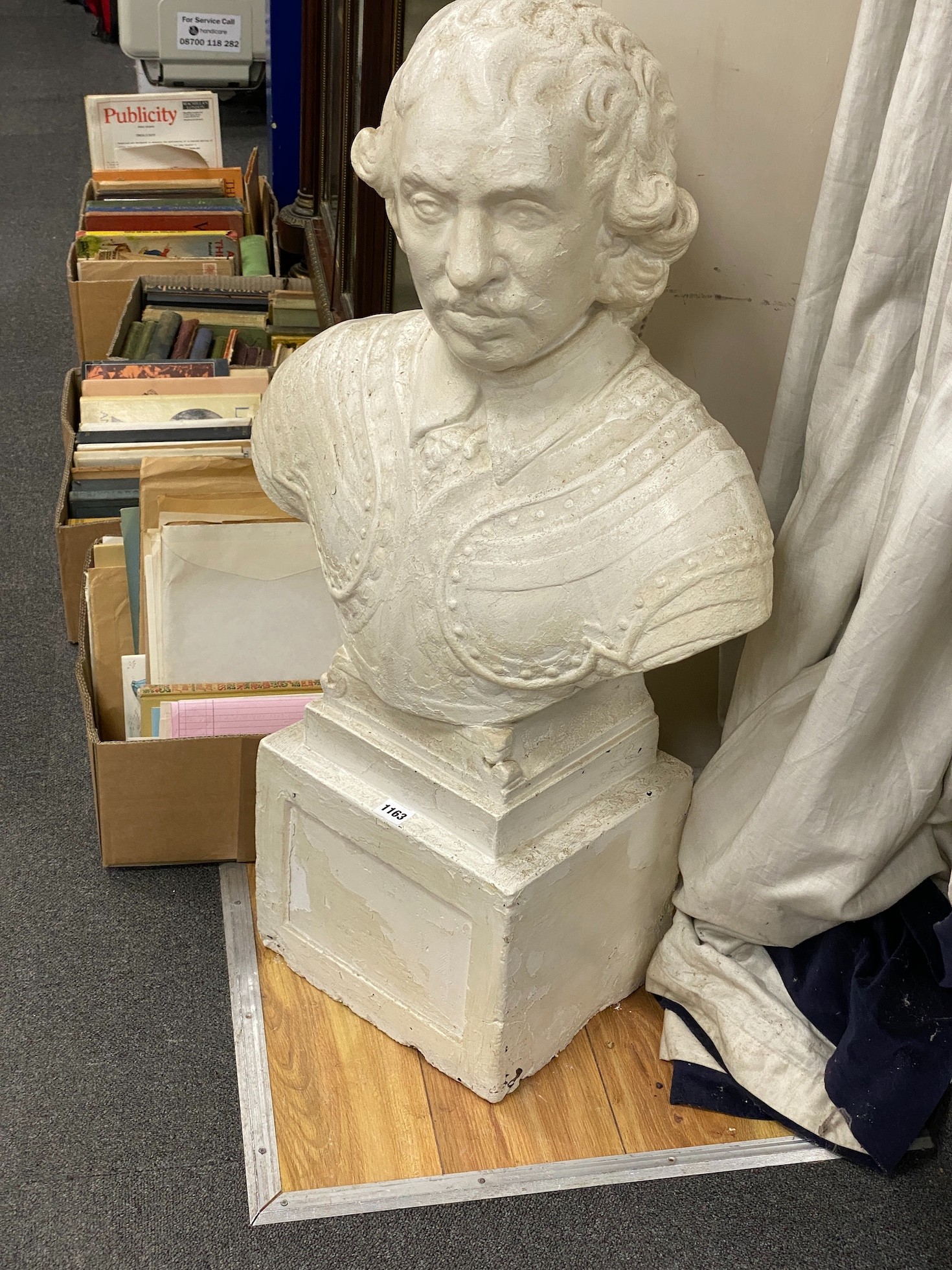 A plaster bust of Oliver Cromwell, height 90cm